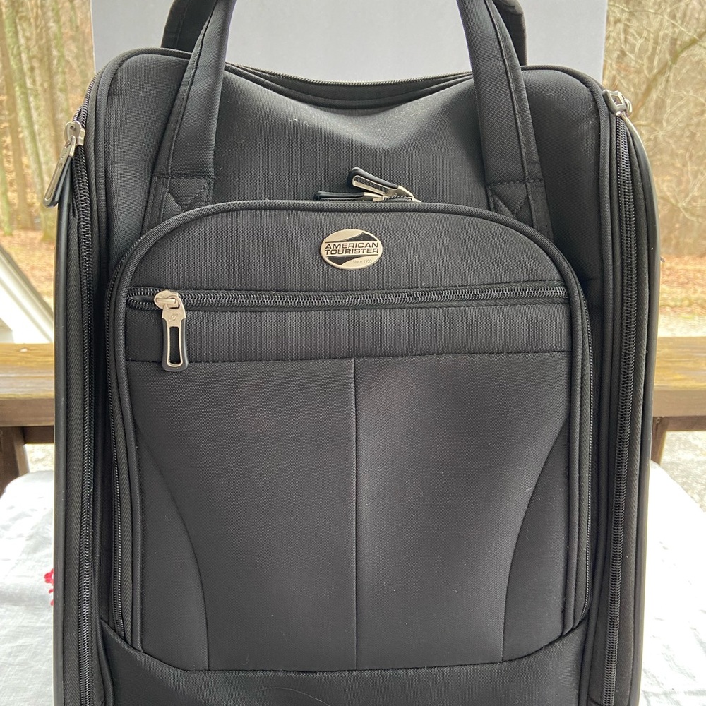 American Tourister Black Luggage with Wheeled Carry-On Design
